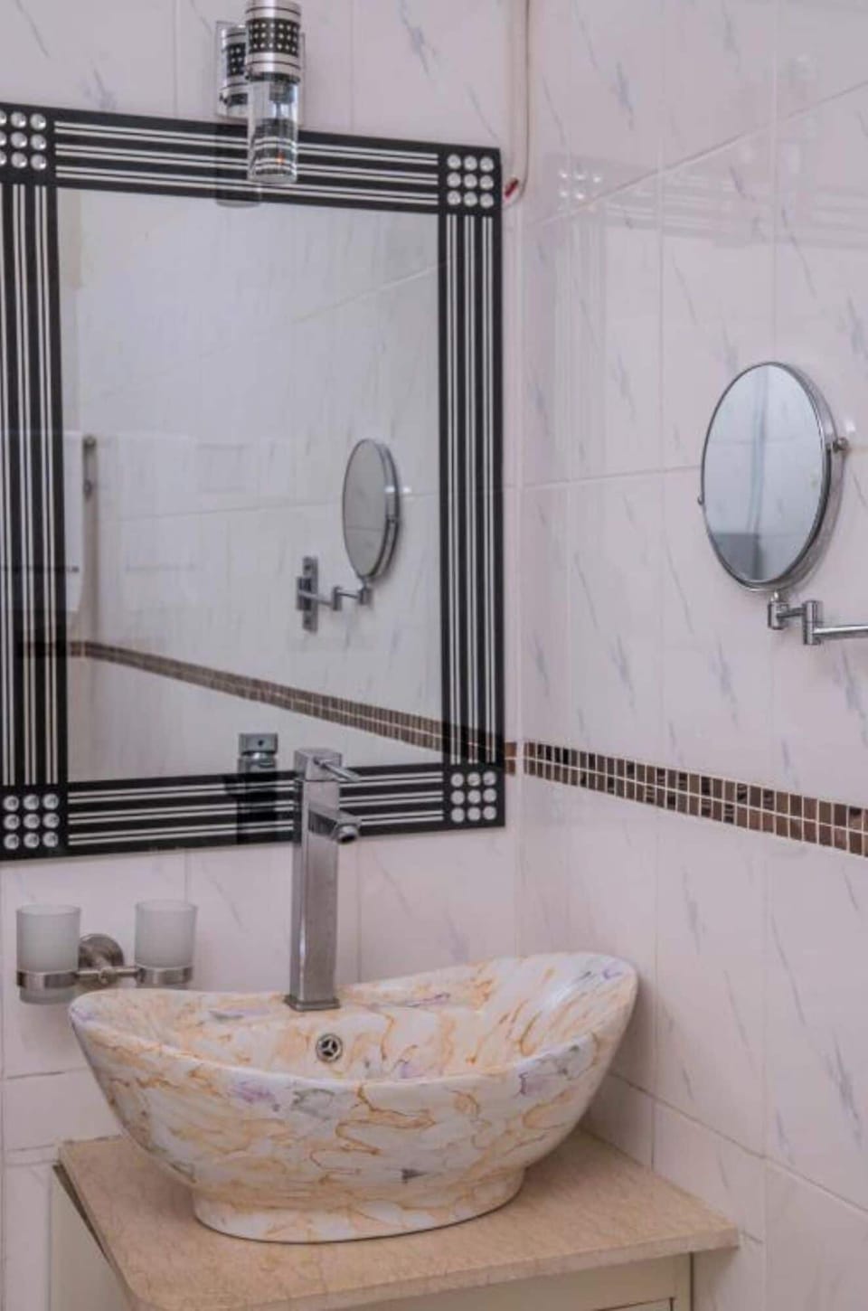 Shower, rainfall showerhead, slippers, towels