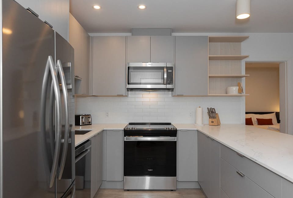 Condo | Private kitchen | Coffee/tea maker, full-size fridge, microwave, oven