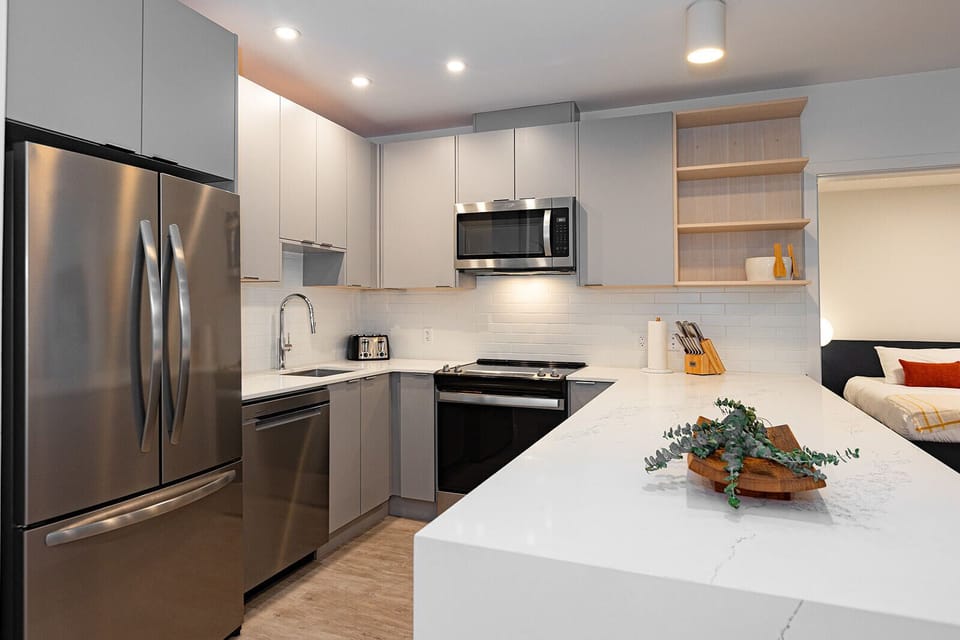 Condo | Private kitchen | Coffee/tea maker, full-size fridge, microwave, oven