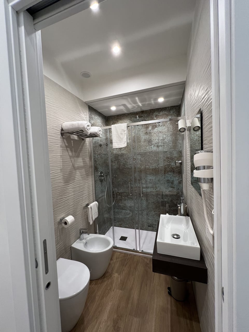 Deluxe Triple Room, Non Smoking, City View | Bathroom | Shower, rainfall showerhead, free toiletries, hair dryer
