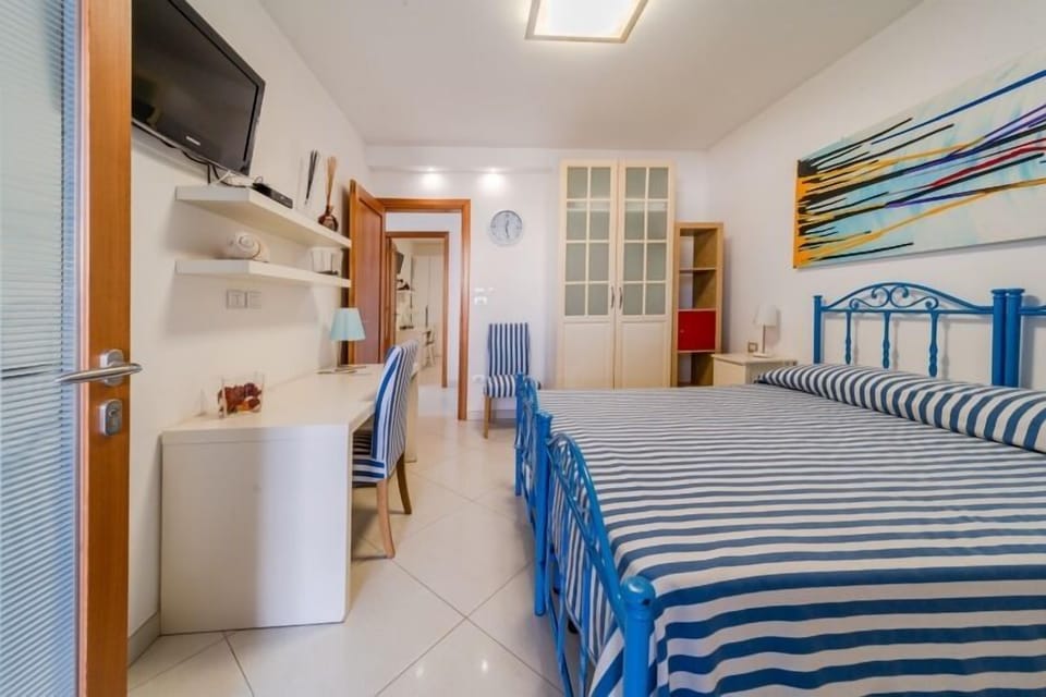 Appartamento per 4 persone | Minibar, desk