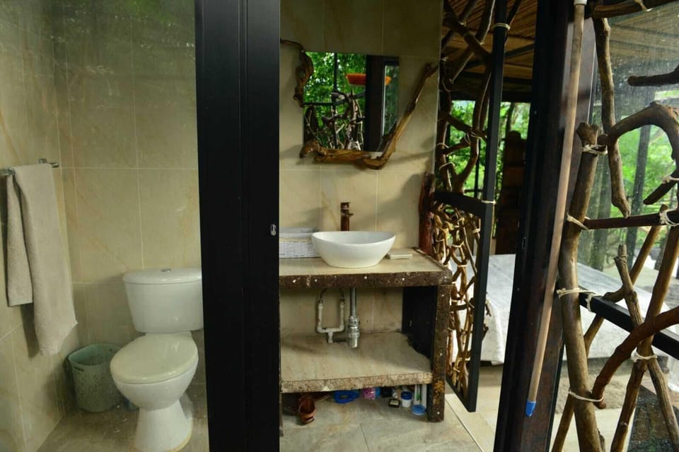 Luxury Cabin | Bathroom | Rainfall showerhead, towels, soap