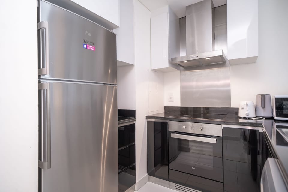 Superior Apartment | Private kitchen | Full-size fridge, microwave, oven, stovetop