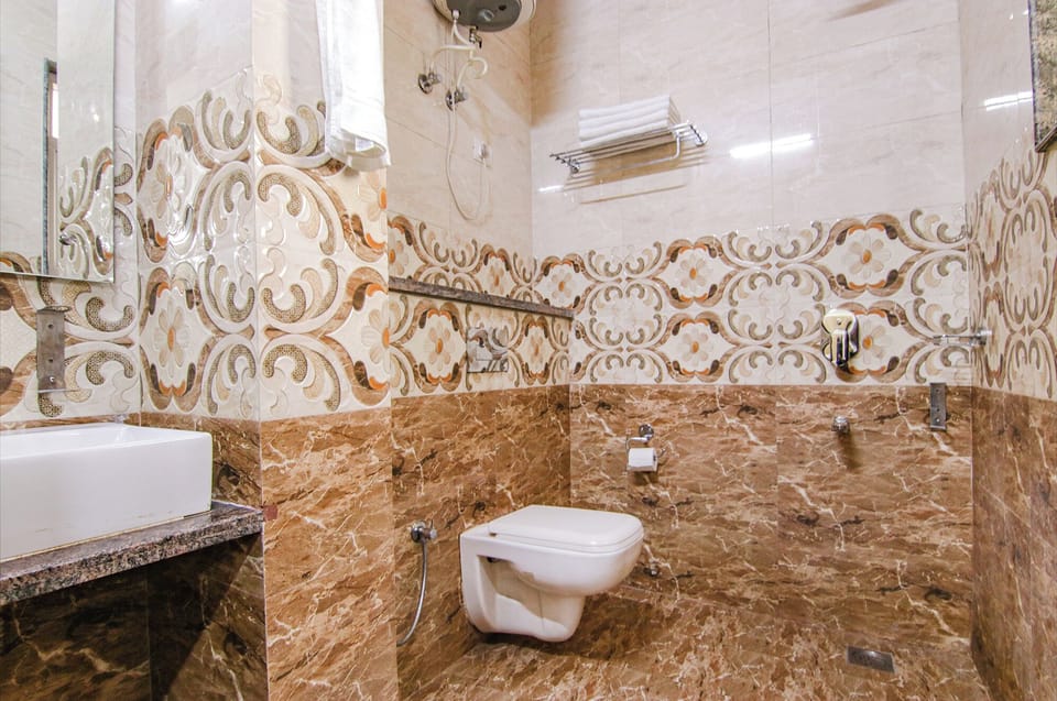 Deluxe Double Room | Bathroom | Shower, rainfall showerhead, designer toiletries, bidet