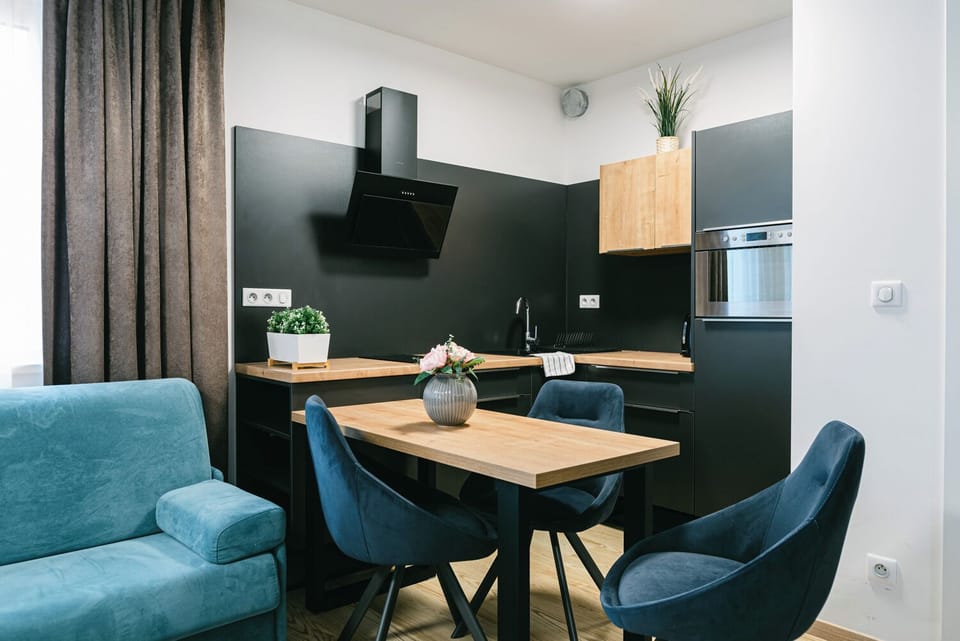 Jarila Boutique Apartment by CHORS | Private kitchen | Full-size fridge, microwave, oven, dishwasher