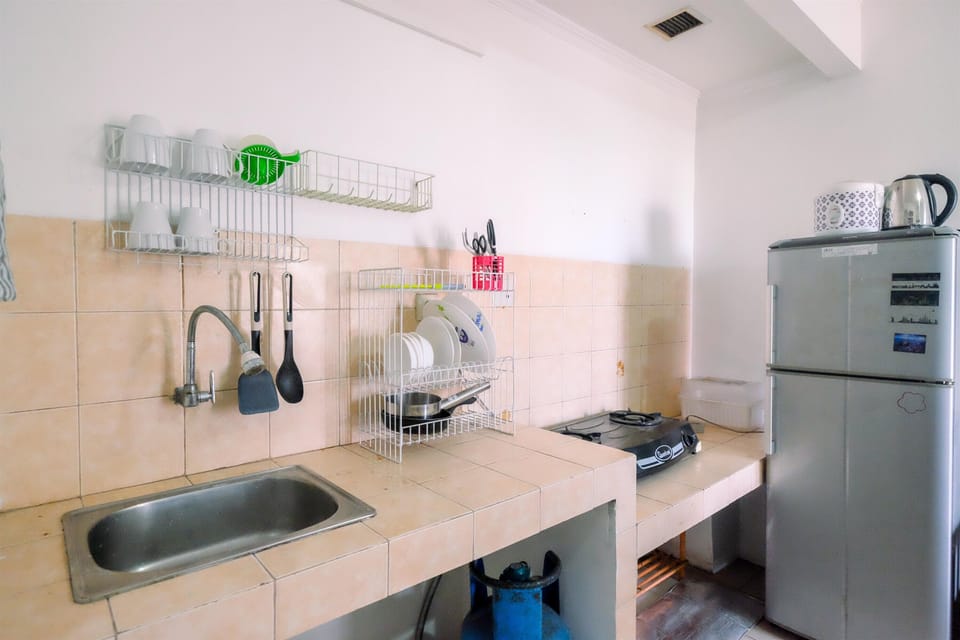 Apartment | Private kitchen | Full-size fridge, stovetop