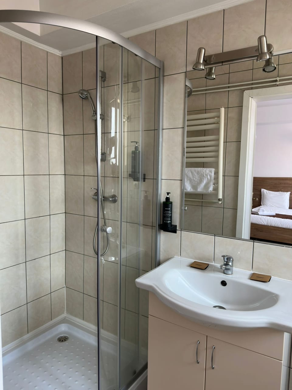 Family Apartment | Bathroom | Shower, hair dryer, slippers, towels