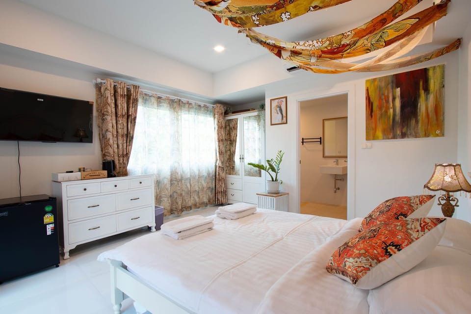 Deluxe Room, 1 Double Bed, Non Smoking, Pool Access | In-room safe, individually decorated, free WiFi