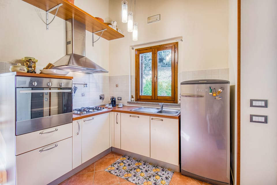 Standard Apartment, 2 Bedrooms, Air conditioning, Mountainside (Tuscan Sun With Shared Pool) | Private kitchen | Coffee/tea maker, dining tables