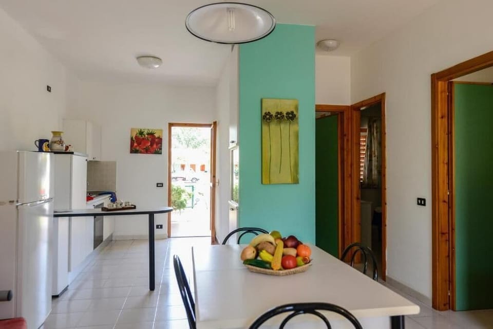 Comfort Villa | Private kitchen | Fridge, stovetop, highchair, coffee grinder