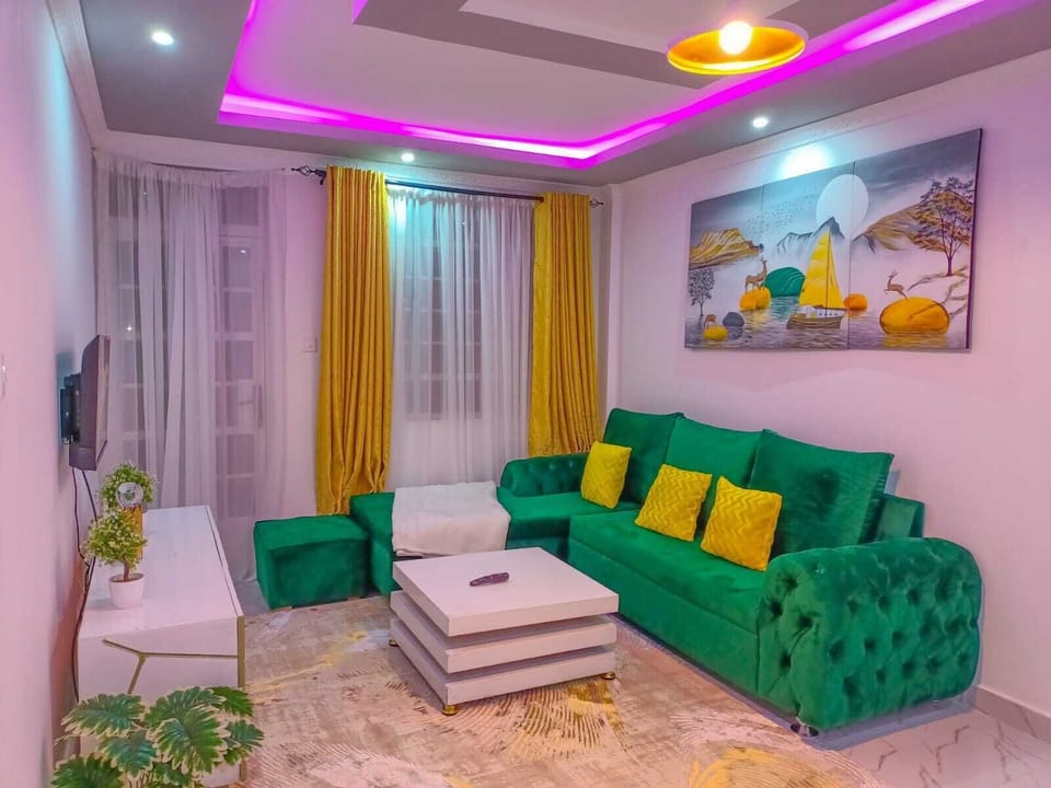 Business Apartment | Living area | 24-inch Smart TV with digital channels