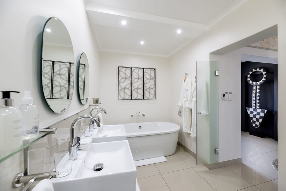 THE BLOEM SUITE TWO  | Bathroom | Designer toiletries, hair dryer, bathrobes, slippers