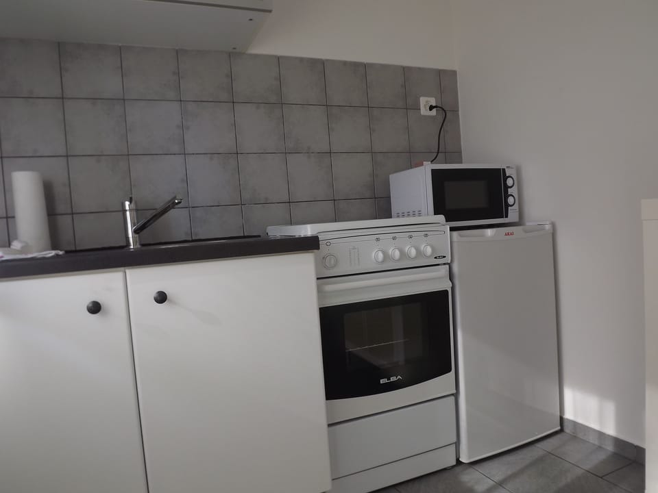 Comfort Suite | Private kitchen | Stovetop