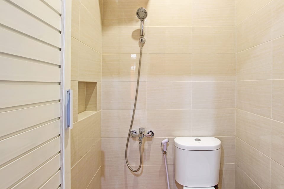 Deluxe Single Room | Bathroom | Shower, soap