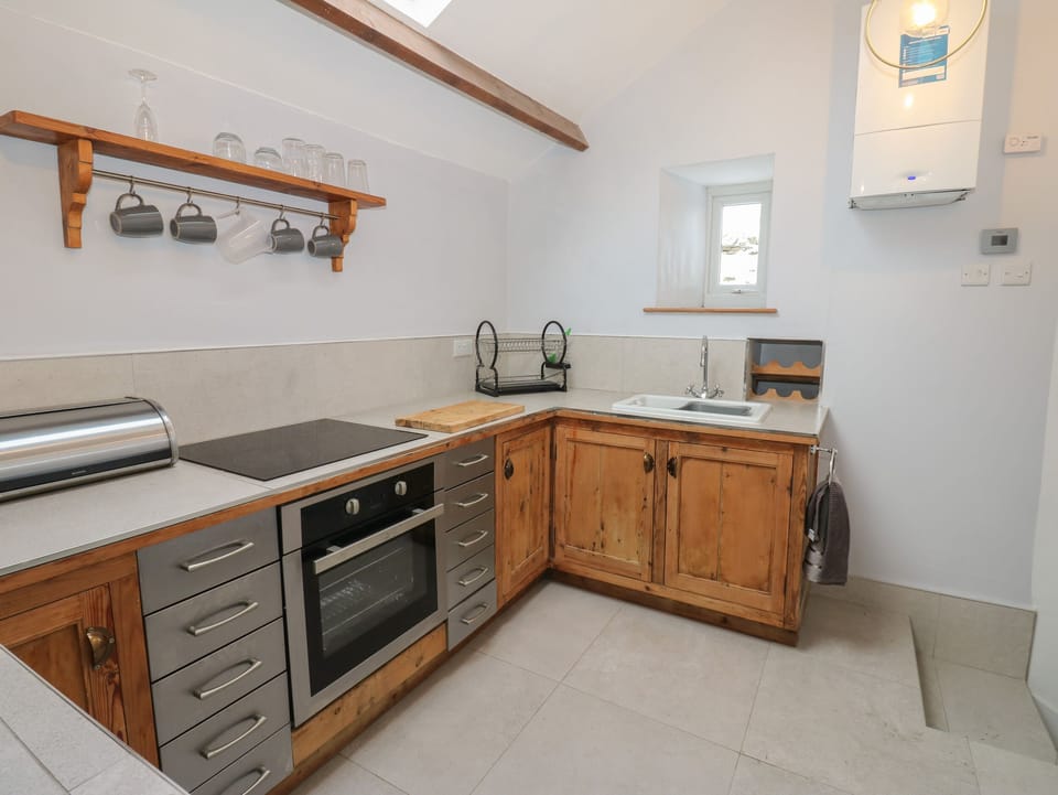 Fridge, electric kettle, toaster, cookware/dishes/utensils