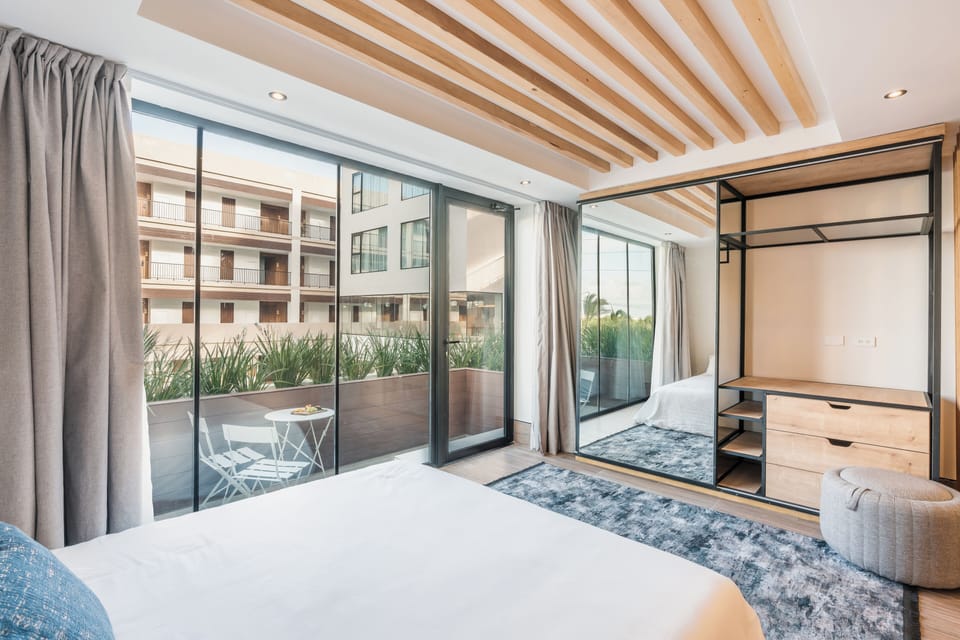Junior Suite, Balcony, Pool View | 1 bedroom, premium bedding, minibar, in-room safe