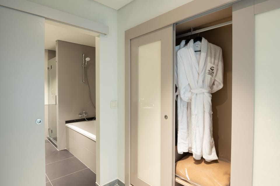 Shower, rainfall showerhead, hair dryer, bathrobes