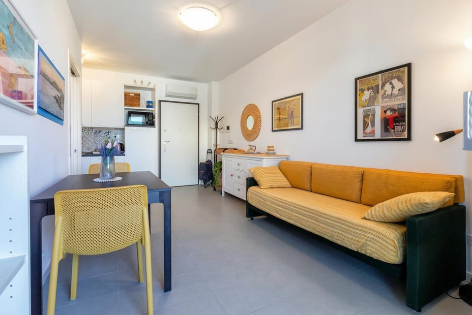 Family Apartment, 1 Bedroom, Balcony (Bilocale Vista Mare Giorgio) | Living area | TV