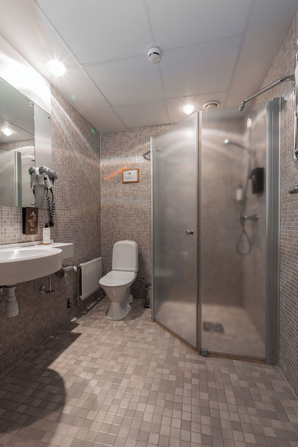 Shower, eco-friendly toiletries, hair dryer, heated floors
