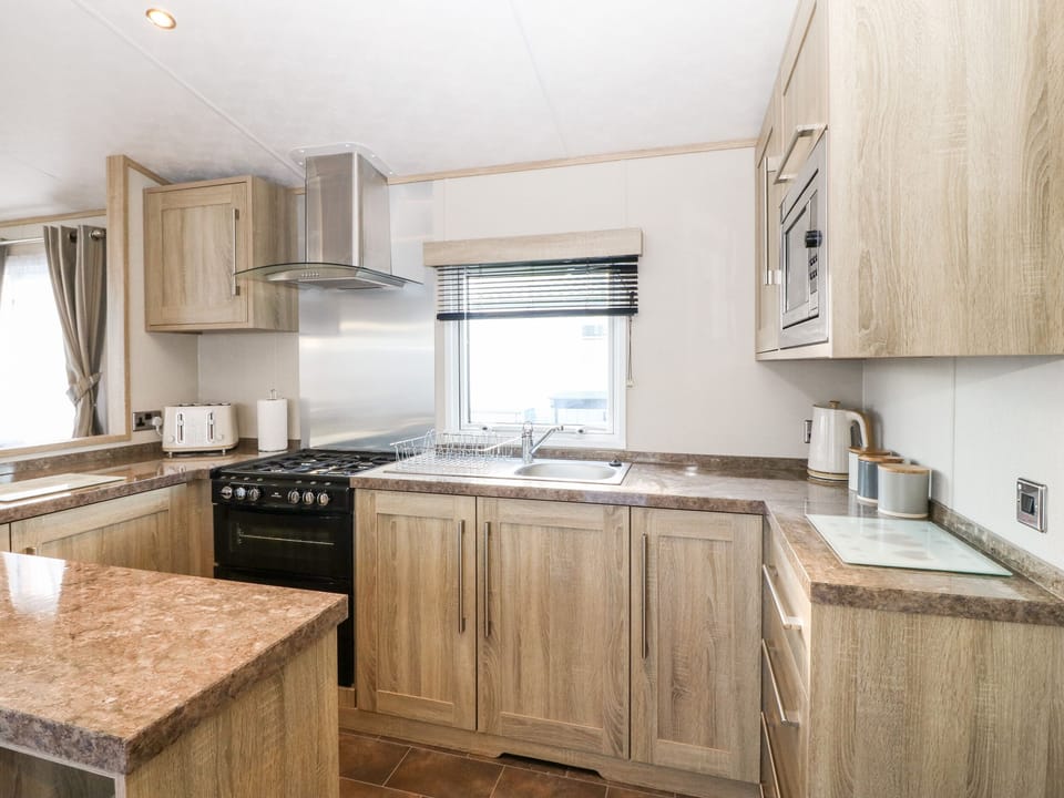 Fridge, electric kettle, toaster, cookware/dishes/utensils