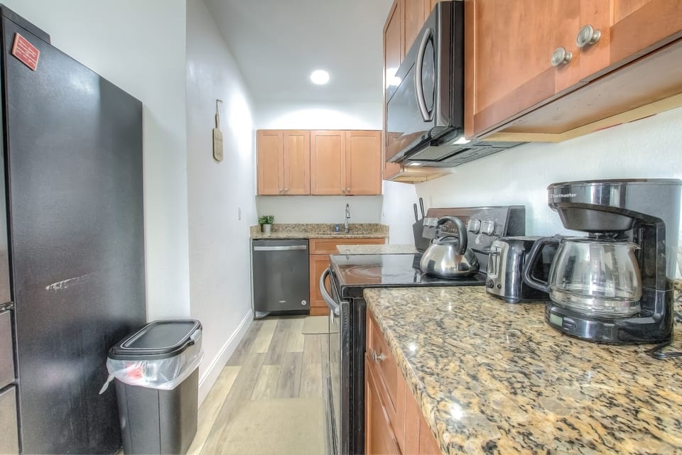 Family Condo, Multiple Beds, 2 Bathrooms, Ocean View | Private kitchen | Microwave, coffee/tea maker, toaster, cookware/dishes/utensils