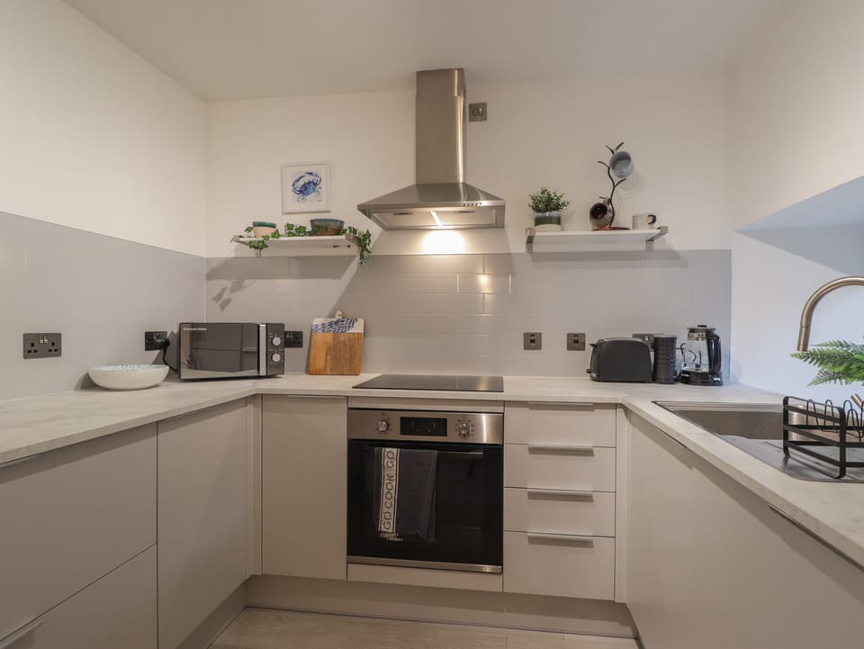 Fridge, electric kettle, toaster, cookware/dishes/utensils