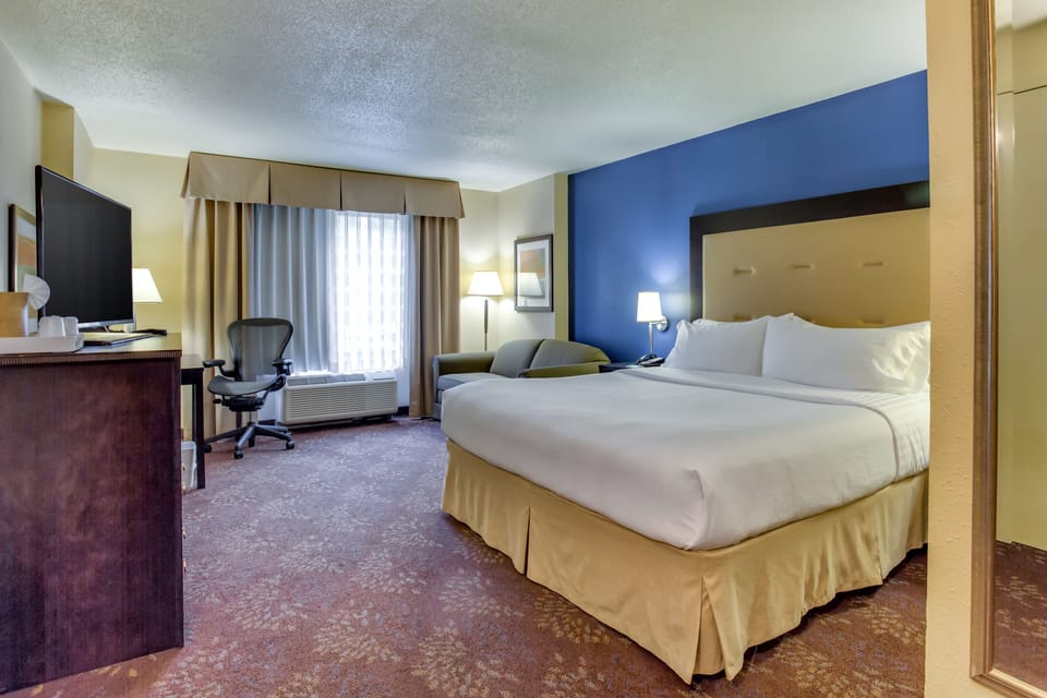 Premium bedding, pillowtop beds, desk, laptop workspace