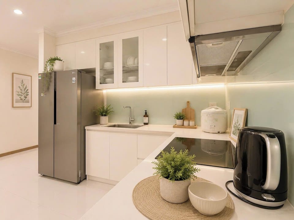 Design Apartment, 3 Bedrooms | Private kitchen | Full-size fridge, microwave, oven, stovetop