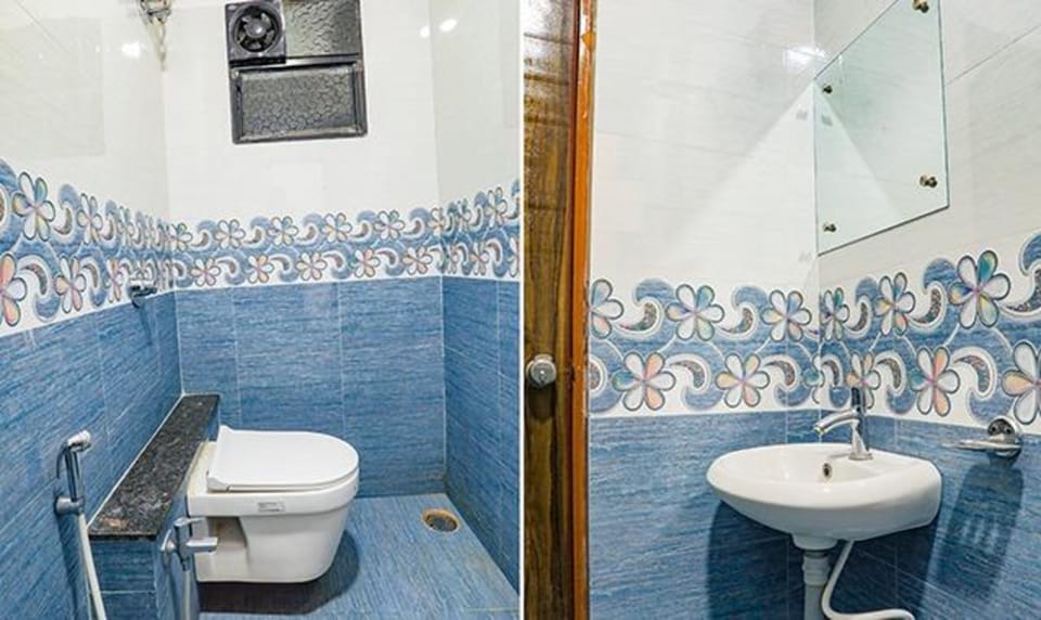 Deluxe Room | Bathroom | Shower, rainfall showerhead, free toiletries, towels