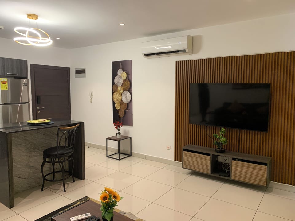 Luxury Apartment, 1 Bedroom, Garden View | Living area | 42-inch TV with satellite channels