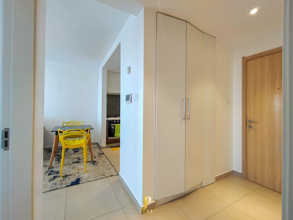 Comfort Apartment | Living area | 24-inch Smart TV with digital channels