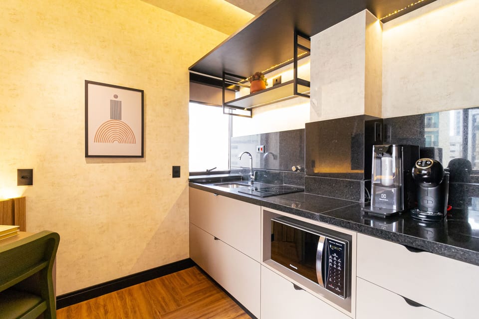 Full-size fridge, microwave, stovetop