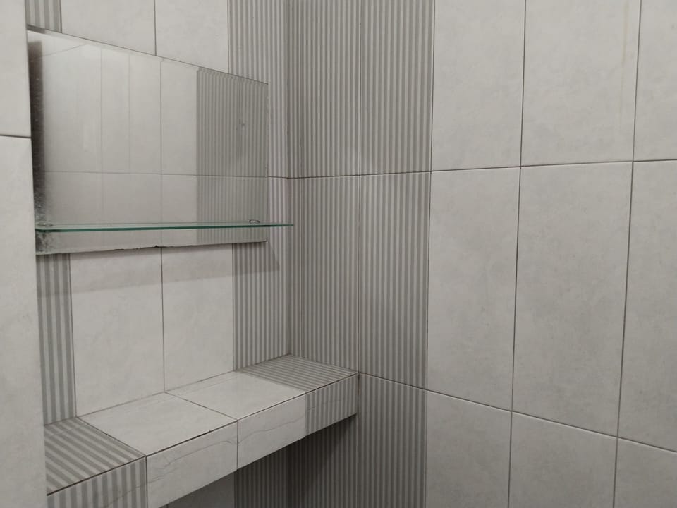 Twin Room | Bathroom | Shower, towels, soap