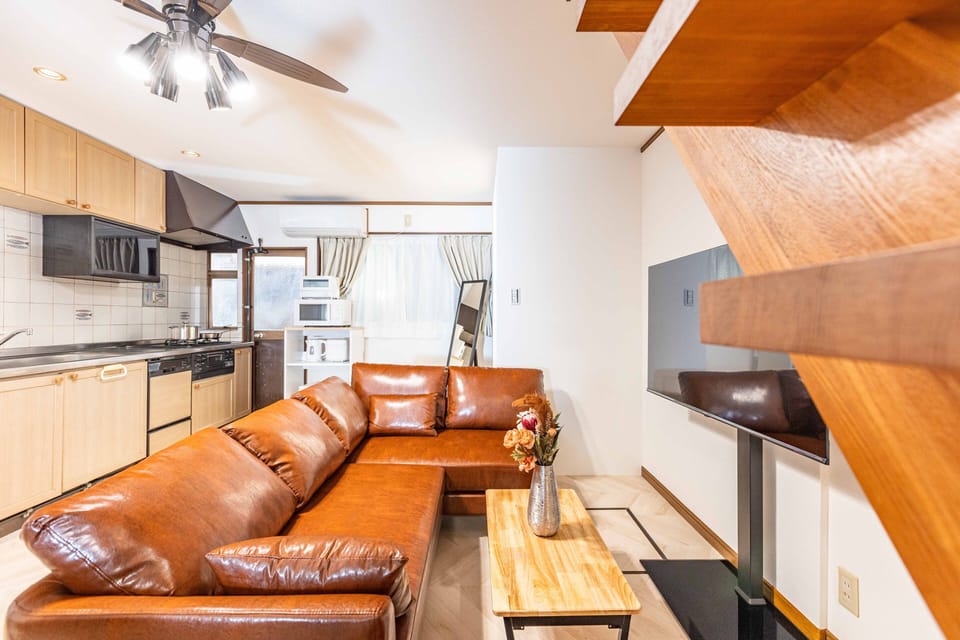 Deluxe House | Living area | Flat-screen TV