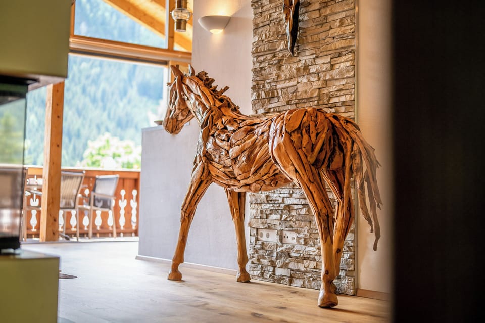 Deluxe Chalet, Mountain View | Living area | TV