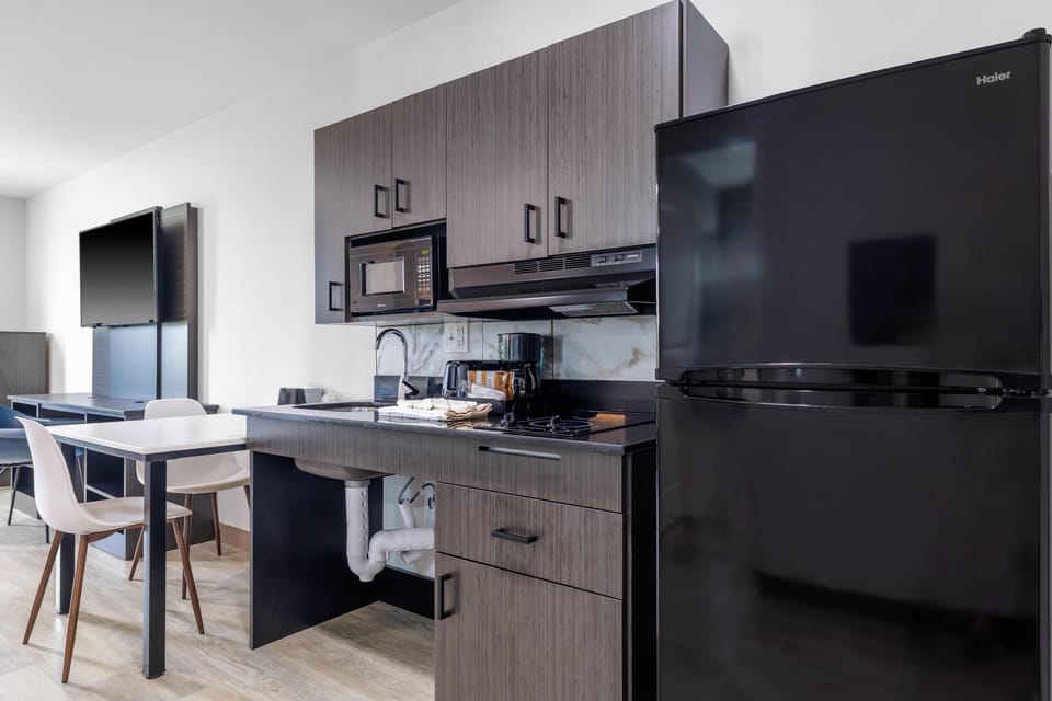 Standard Room, 2 Queen Beds, Non Smoking, Kitchenette | Private kitchenette | Full-size fridge, microwave, stovetop, coffee/tea maker