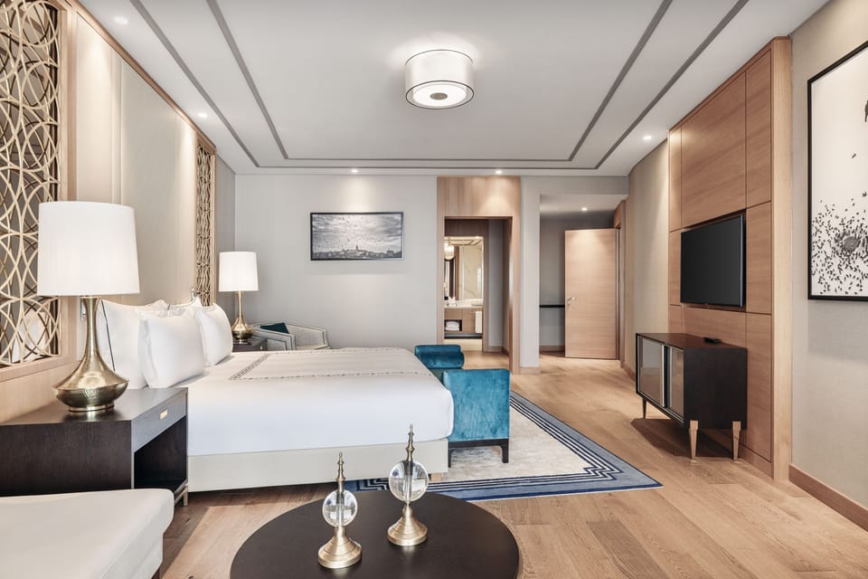 Royal Suite, Sea View | Minibar, in-room safe, laptop workspace, blackout drapes