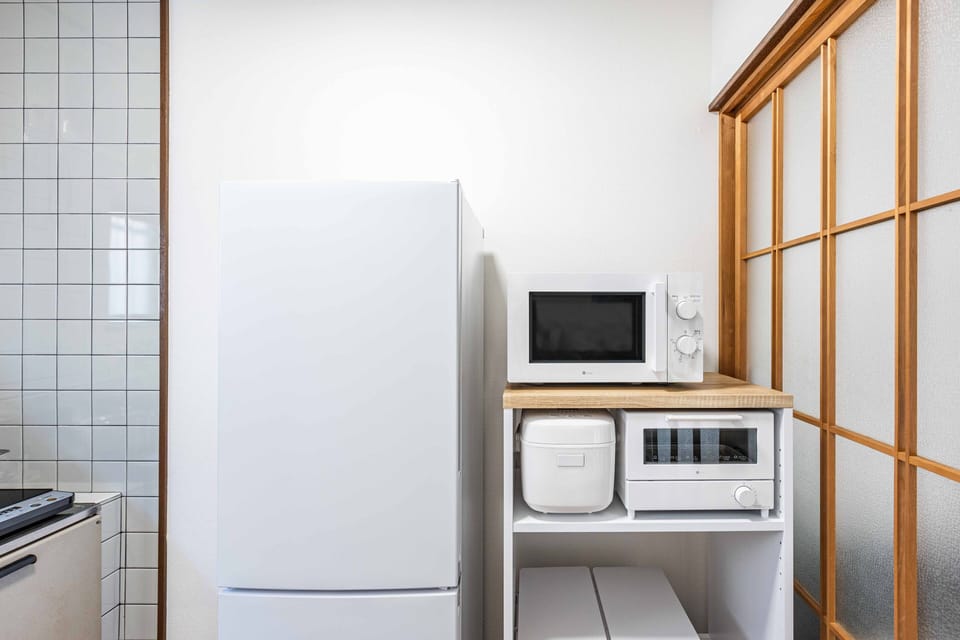 Design House | Private kitchen | Full-size fridge, microwave, stovetop, electric kettle