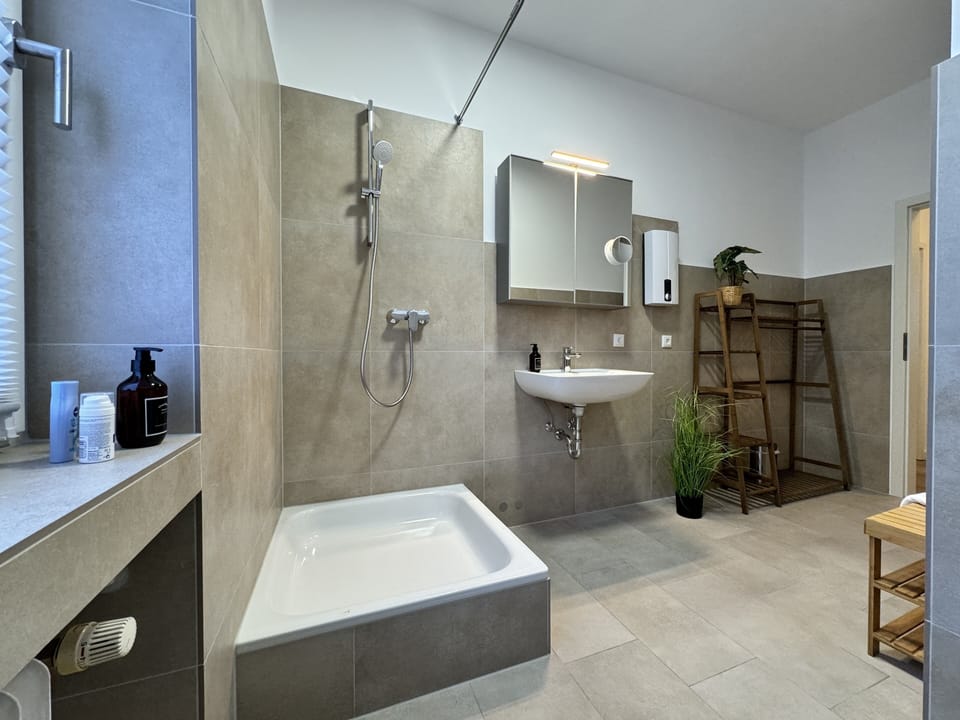 Condo | Bathroom | Shower, hair dryer, towels