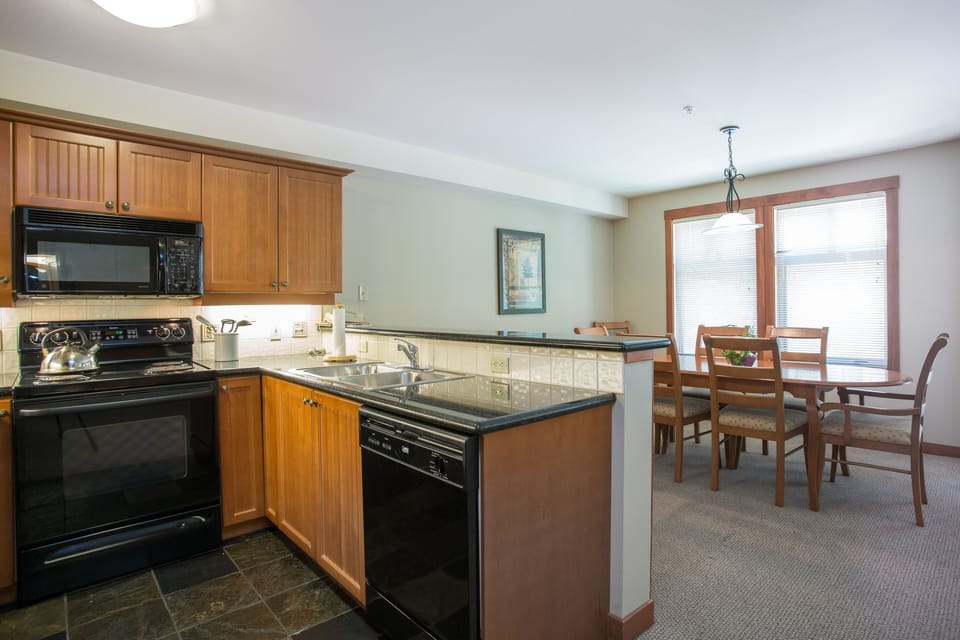 Condo, 2 Bedrooms | Private kitchen | Coffee/tea maker, fridge, oven, toaster