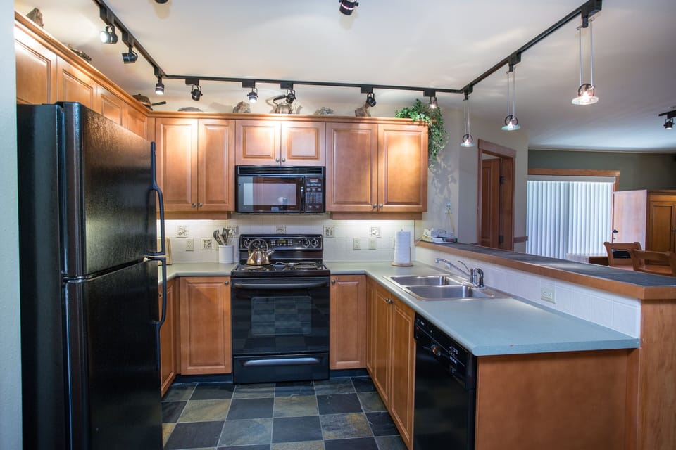 Condo, 2 Bedrooms | Private kitchen | Fridge, coffee/tea maker, toaster