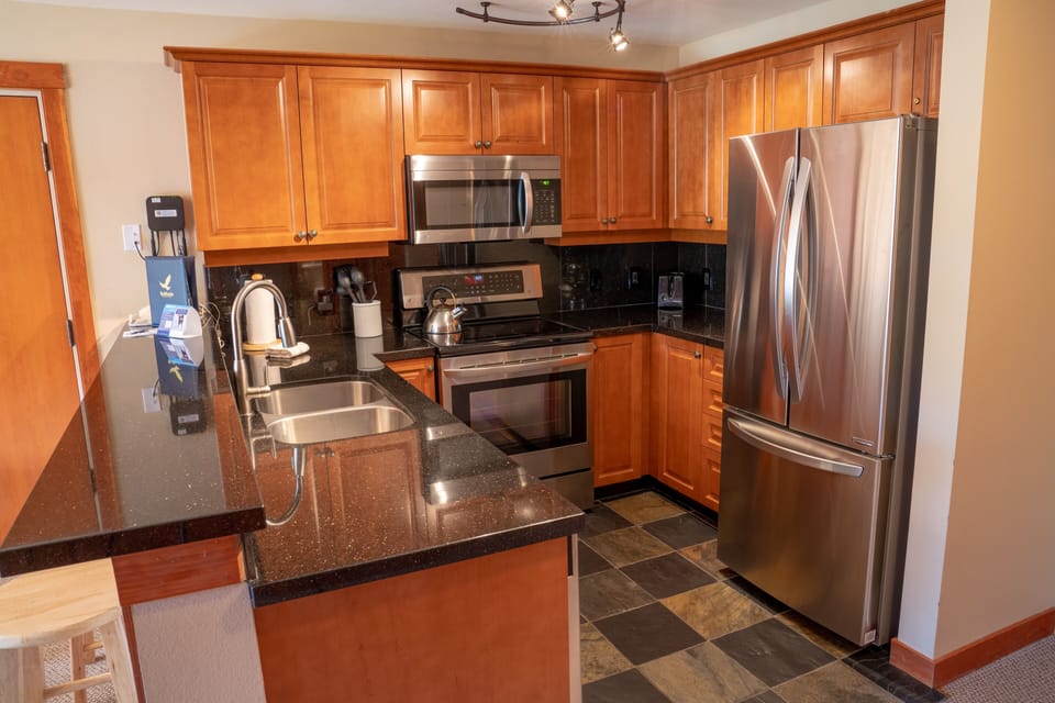 Condo, 2 Bedrooms | Private kitchen | Coffee/tea maker, fridge, oven, toaster