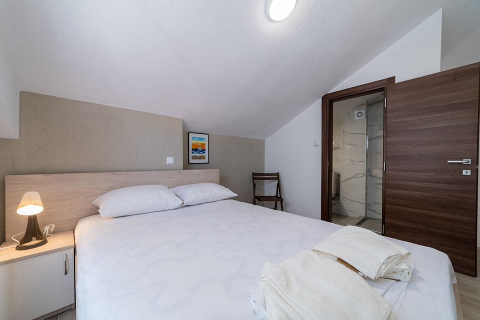 2 bedrooms, blackout drapes, iron/ironing board, WiFi (free)