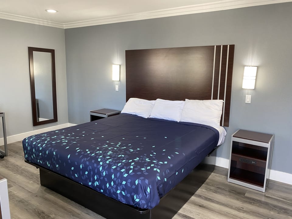 Deluxe Room, 1 King Bed (No Hot Tub) | Individually furnished, desk, laptop workspace, blackout drapes