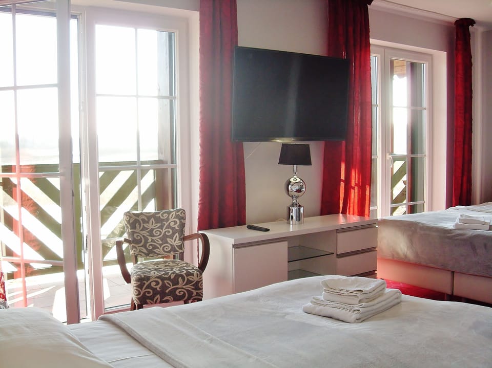 Panoramic Quadruple Room, 1 Bedroom, Balcony | Individually decorated, individually furnished, desk, cribs/infant beds