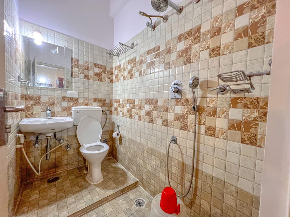 Shower, rainfall showerhead, towels
