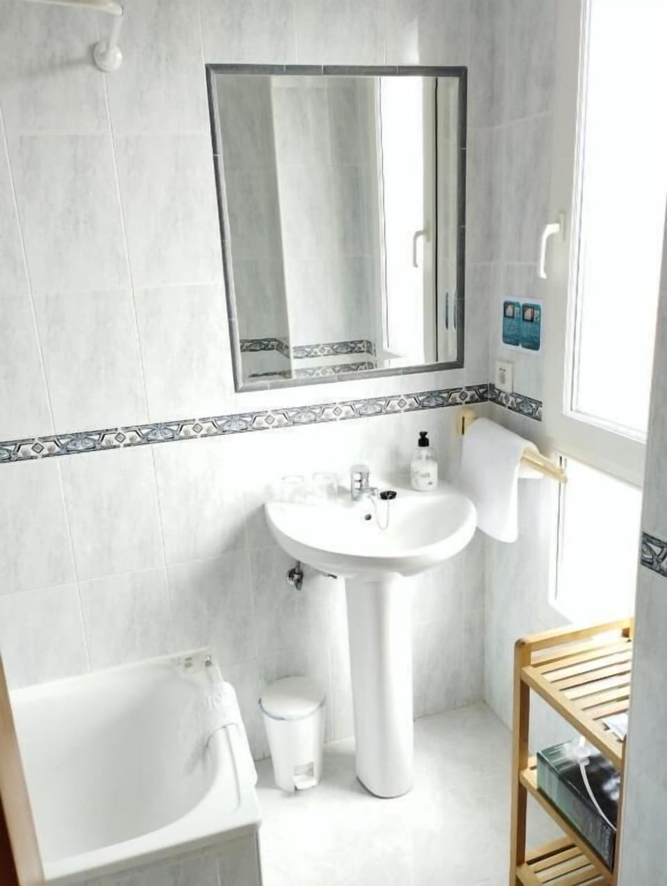 Bathtub, hair dryer, towels