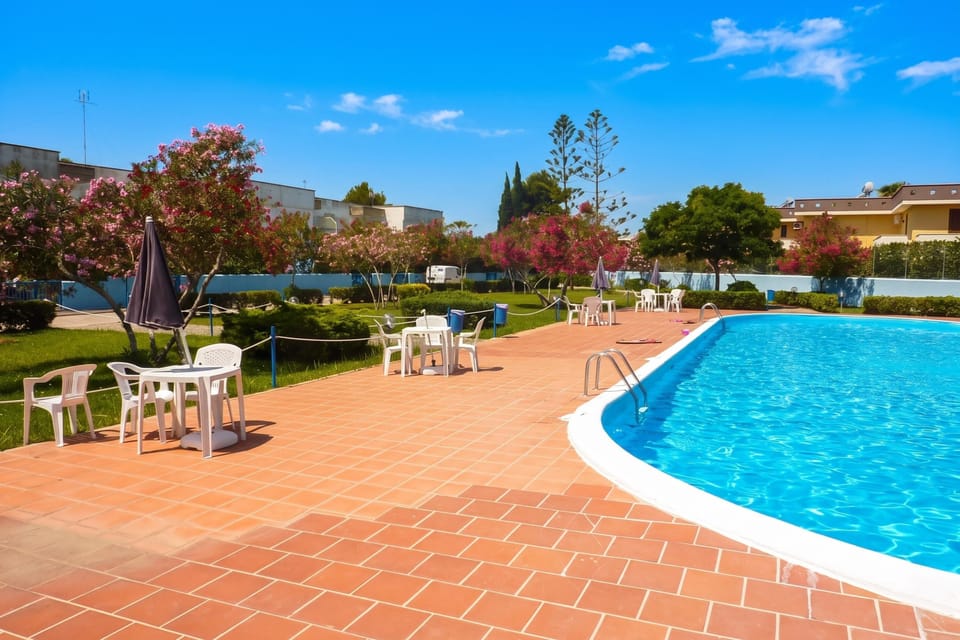 Family House, 2 Bedrooms, 2 Bathrooms (Villetta Relax with Garden, Pool and) | Pool | Seasonal outdoor pool