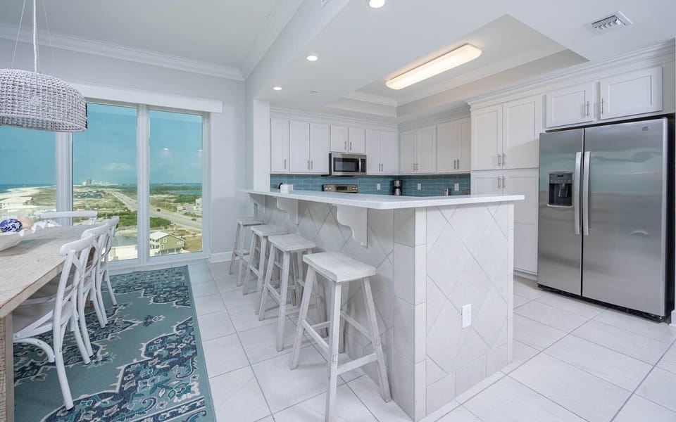 Condo, 4 Bedrooms | Private kitchen | Coffee/tea maker, fridge, oven