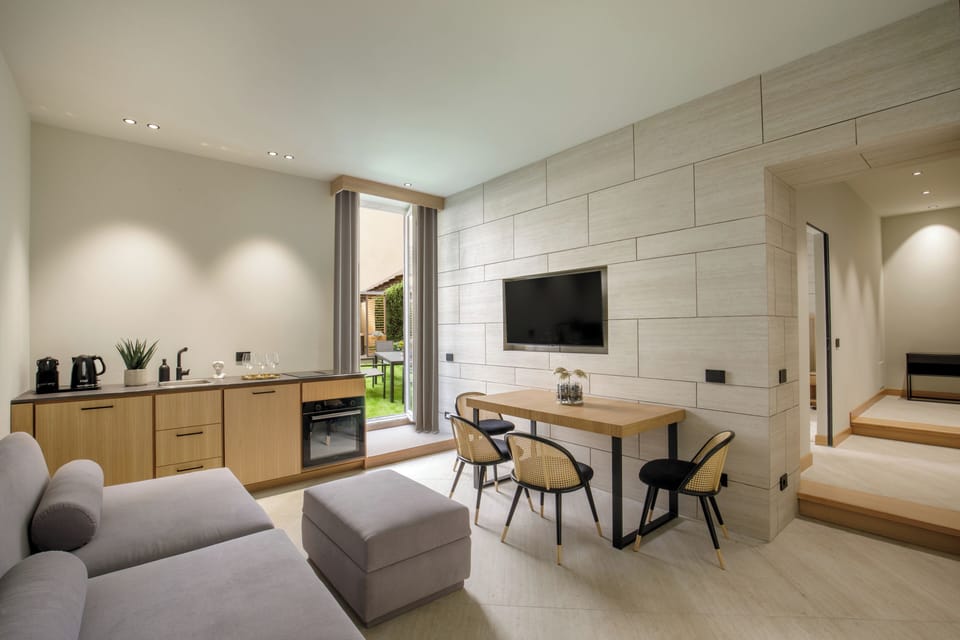 Apartment, Terrace | Living area | 50-inch Smart TV with digital channels